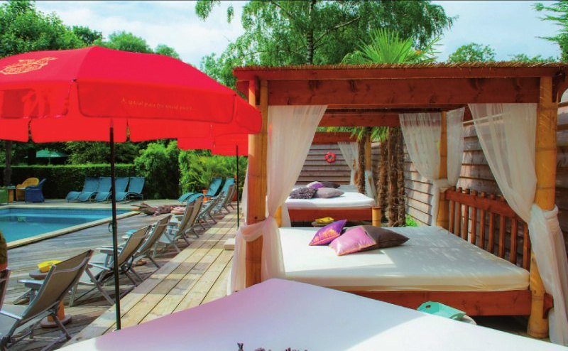 Day bed under the parasol